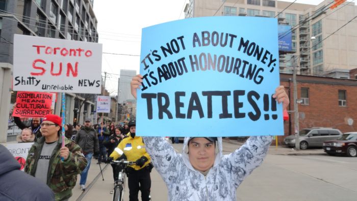 Protesters rally outside of the Sun News studio in Toronto on January 19, 2013, voicing concern over what they call the station's racist overage of Idle No More. PHOTO: Peter Biesterfeld.
