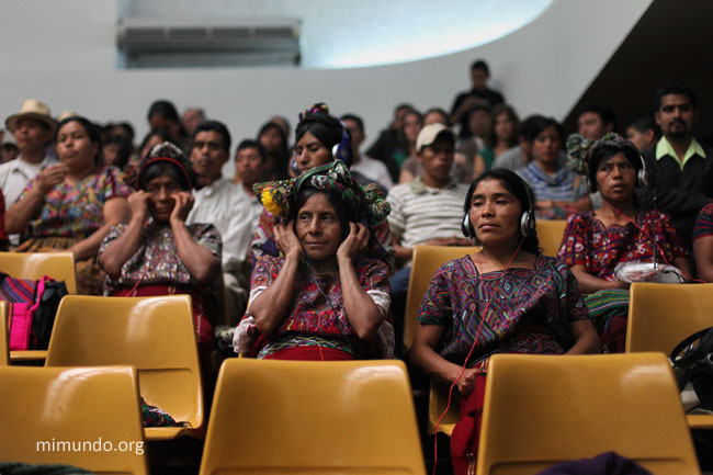 Ixil Maya women listen to the Spanish-Ixil translated courtroom proceedings during the twentieth day of the trial. Photo by James Rodriguez / Mimundo.org. Used with permission.