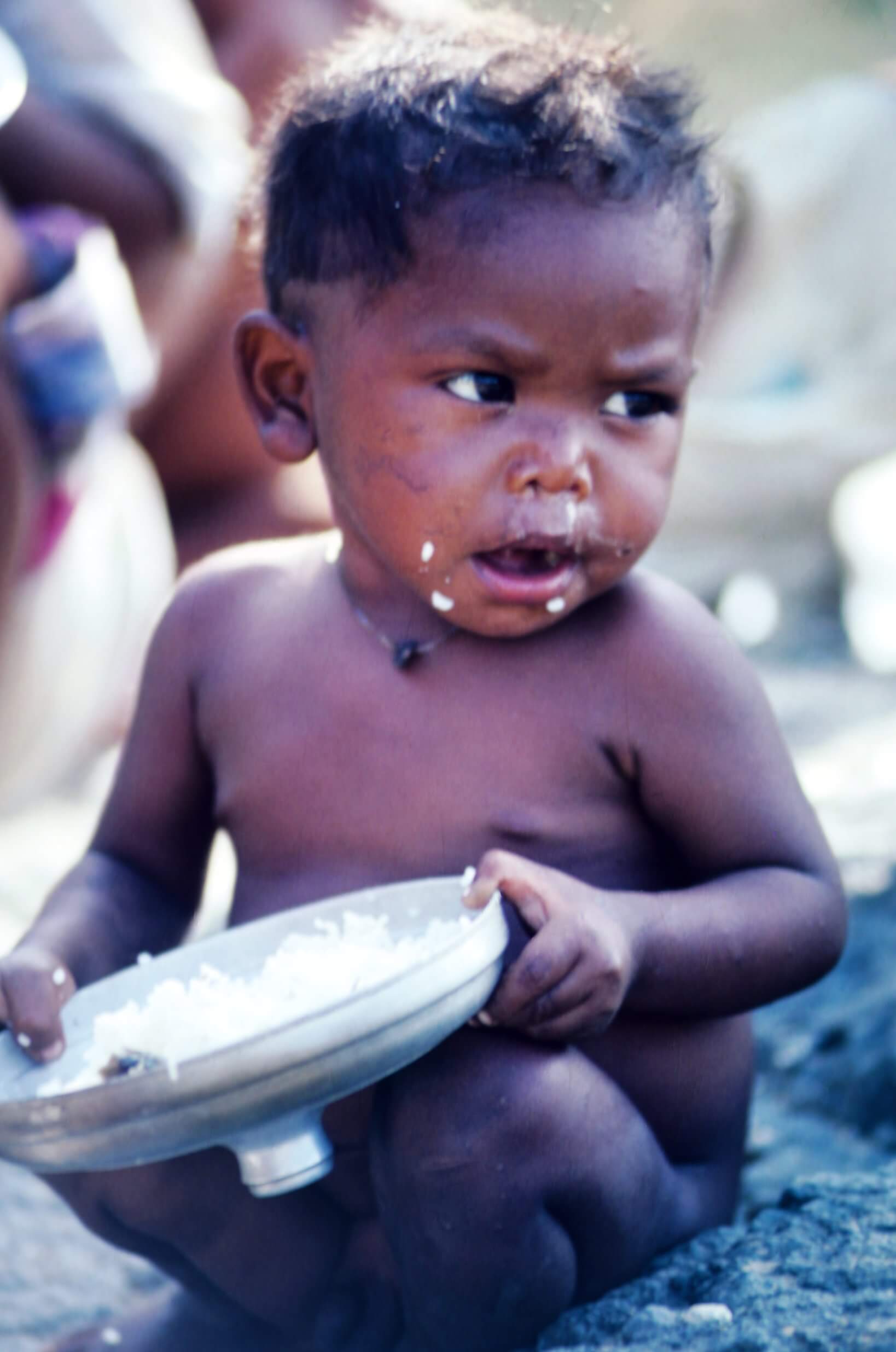 IPs victim of the ban against ‘kaingin’. This child is forced to eat small quantities of purchased rice since his tribe can no longer plant it. 