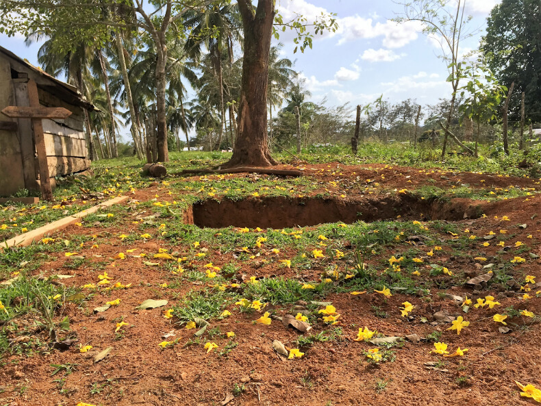 An open grave in the frontier community of La Esperanza, in February of 2016; Parker captured this image shorty after family members had arrived to collect the bodies following a vicious attack by Colonos that took the lives of two men, and pillaged most of the supplies left in the rapidly vanishing traditional Miskitu community. Photo by Courtney Parker.