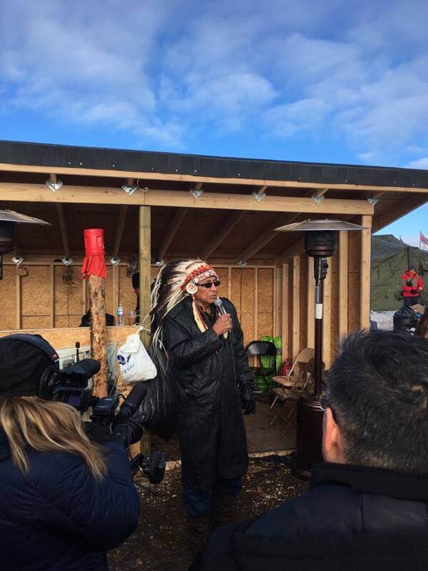 Chief Arvol Looking Horse announcing the U.S Army Corps  decision. Photo: Nelson Denman