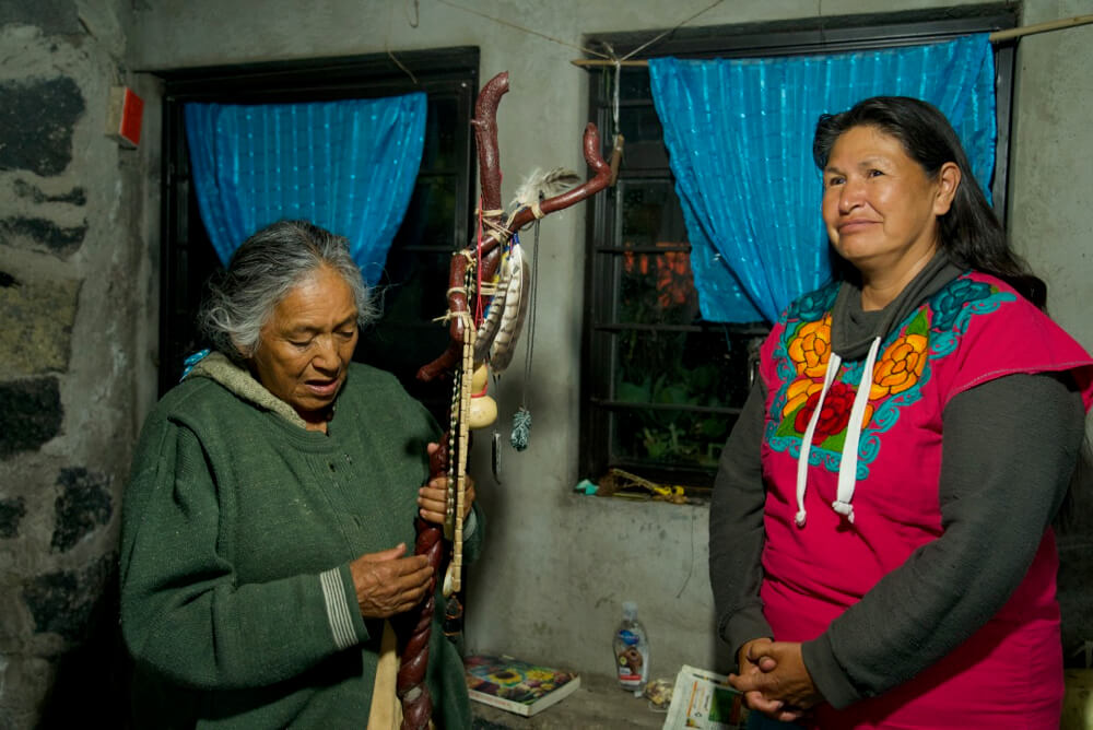 Abuela Amalia shares her Water Staff with Cheryl